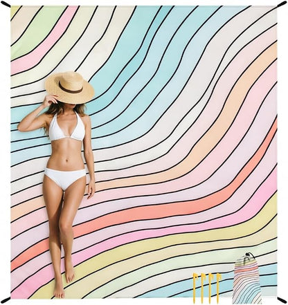 Sand-free waterproof beach blanket with stakes